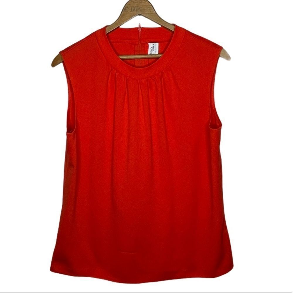 Vintageย Todayโs Times Sleevelessโ Top